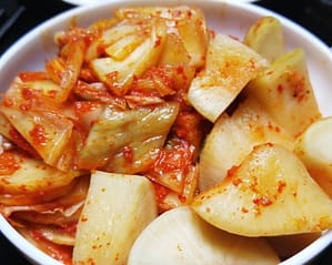 A bowl of radish kimchi