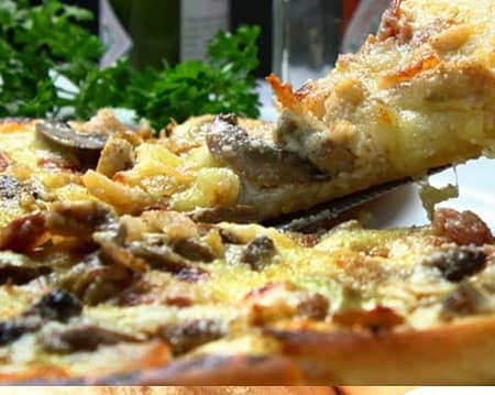 Pizza slice with vegetables