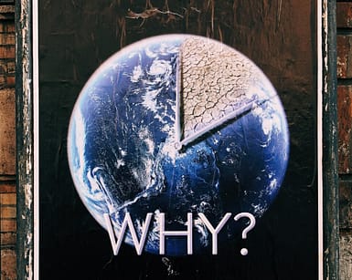 earth as a clock with the word "why"