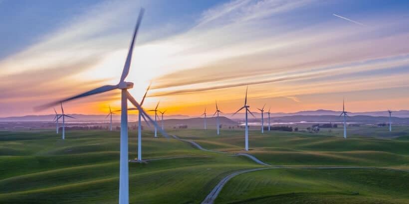 mid course_banner_bannersnack windmills in a field