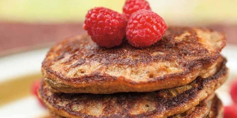 grainfree_plantainpancakes plantain blender pancakes with raspberries on top